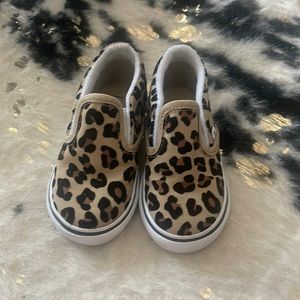 Leopard print vans.